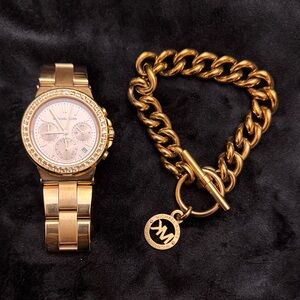 Michael Kors Rose Gold Tone Watch & Bracelet 
Needs New Battery  Selling As Is
